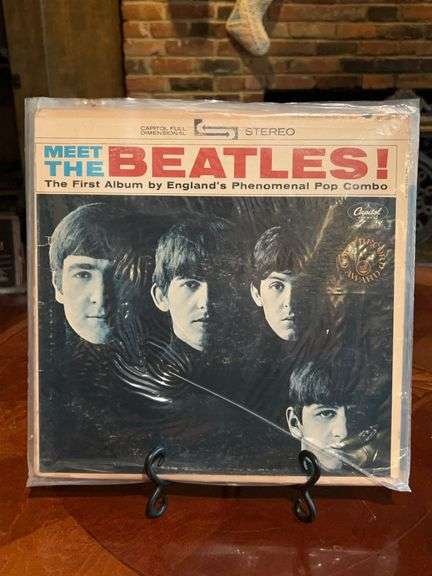 Grouping of (5) Meet the Beatles albums and (1) cover image