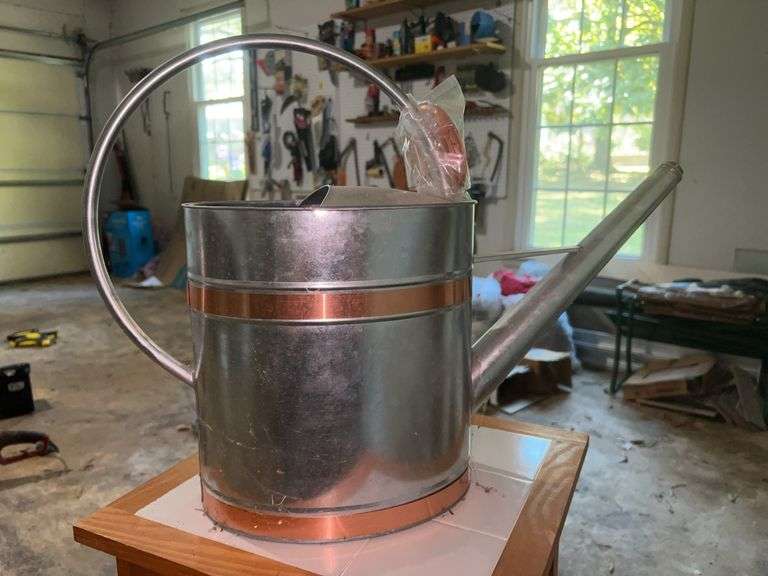 Like new 2 gallon metal watering can with copper pour spout and banding image