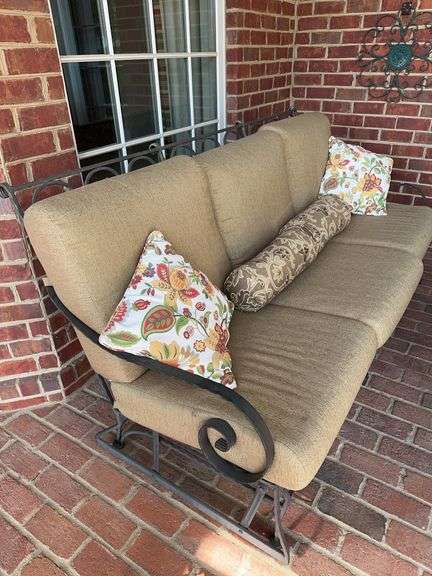 Three cushion glider with pillows image