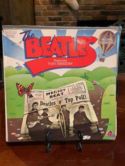 Grouping of 10 Beatles albums…..some are duplicates and some covers are torn image
