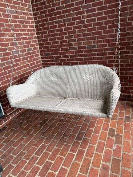 White wicker swing image