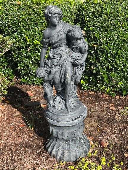 Concrete statue on pedestal image