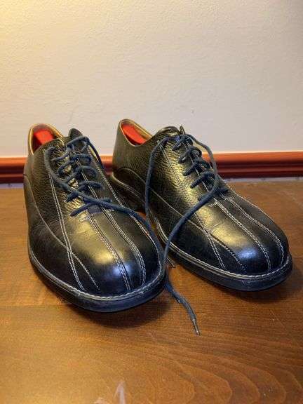 Pair of like new Florsheim black leather casual shoes….size 10M image