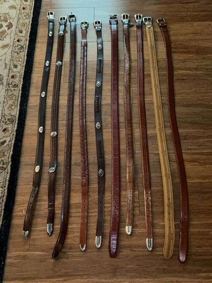 Variety of sizes and style brown leather belts…..sizes range from 38 to 42 image
