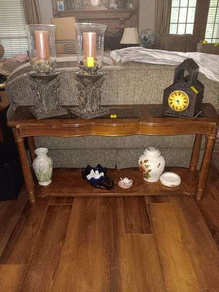 Sofa Table with 3 glass inserts and bottom shelf..56x26x26..Items on bottom shelf not included