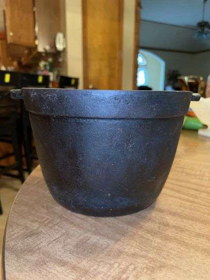 Unmarked cast iron bean pot…..9-1/2”D x 6-1/2” tall image