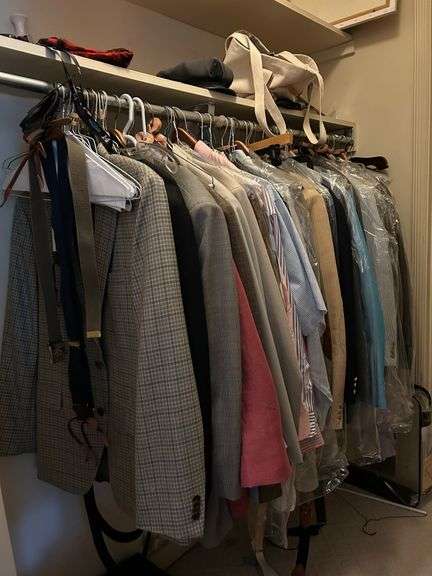 Contents of closet…..Sizes vary…..shirts are L/XL, jackets are 45R, 44R, 54R…..makers include Ralph Lauren, Chaps, Alan Flusser, Christian Brooks and more…..includes various size pieces of luggage image