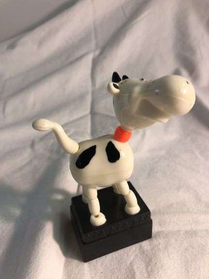Vtg black and white dog push up puppet. 4” H. image