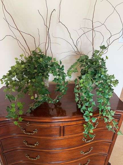 Pair of vases with silk plants image
