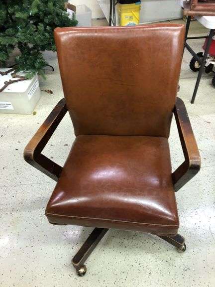 Vtg leather and wood office chair. 38.5” H x 24.75” across arms.  Seat 19” D x 21” W x 18.5” H. image