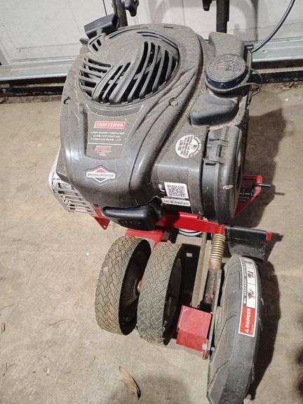 Craftsman Lawn Edger/Trencher Curb Hop Feature 3 Position Bevel Cut, Briggs & Stratton 550 Series 140 cc. With manuals and extra blade. Used, untested image