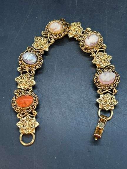 Beautiful gold tone decorative bracelet with multi-color cameo accents…..6” image