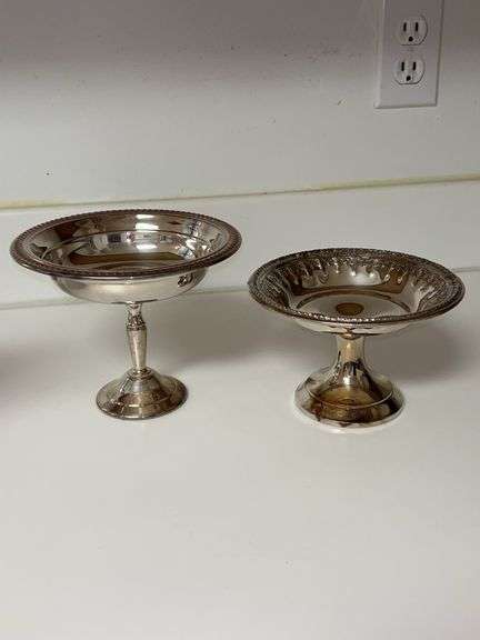 Grouping of (2) nice looking silver plate compotes….left is by F.B. Rogers (6-1/2”D x 5-1/2” tall) and right is by Reed & Barton (6-1/4”D x 4-1/4” tall image