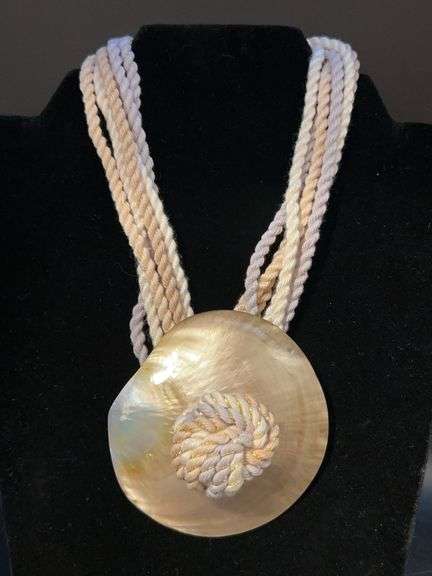 Nice looking soft multi-strand rope necklace with shell disc pendant image