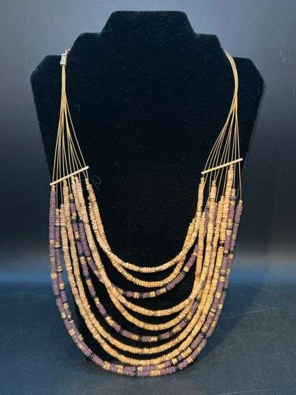Multi-strand wood bead necklace in earth-tone colors image