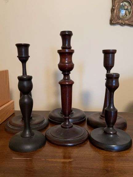 Grouping of (8) wood candlesticks…..sizes range from 7-12” tall…..2 more were added so please see last pic image