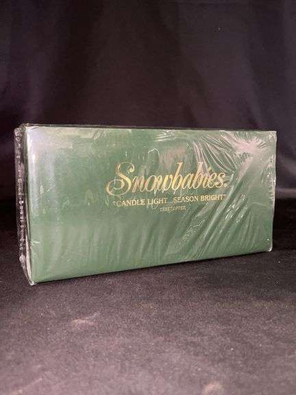 NIB Dept. 56 Snowbabies “Candle Light….Season Bright” bisque porcelain tree topper….box is sealed and image is an online for picture purposes only image