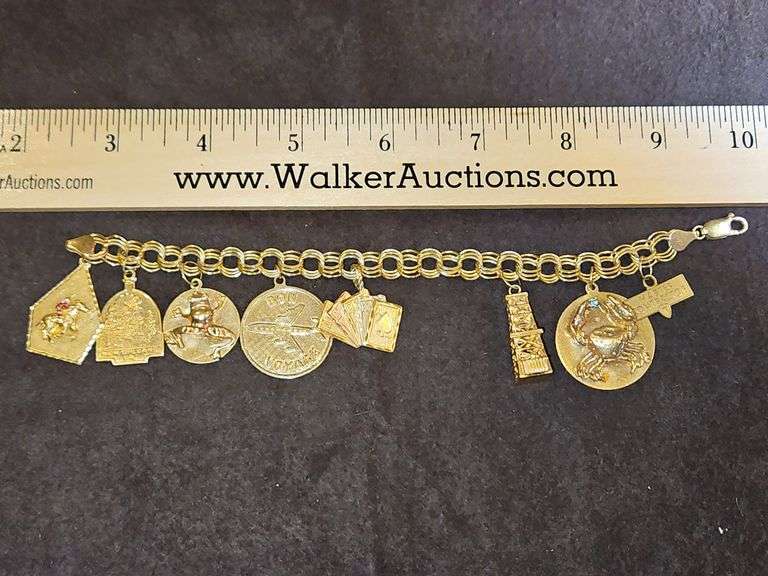 Beautiful Ladies 14K gold charm bracelet w/8 charms of various Ks(SEE PICS) 49.5 total grams... image