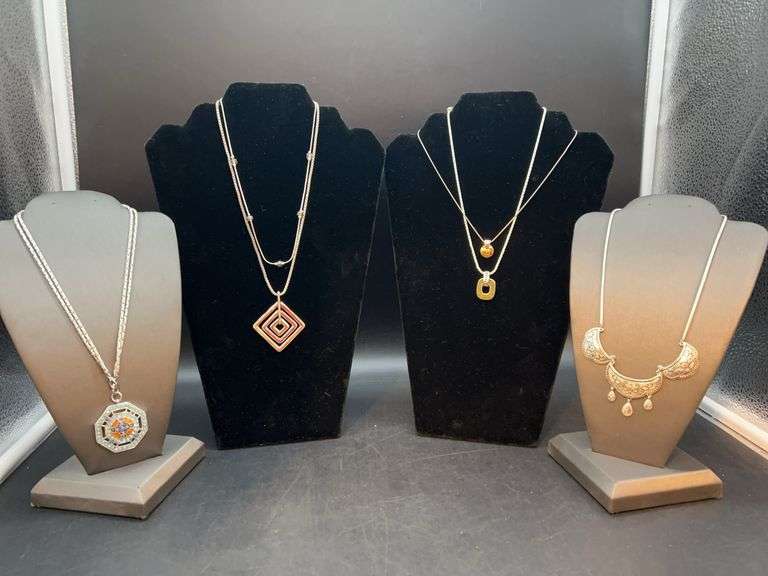 Grouping of great looking silver tone necklaces image