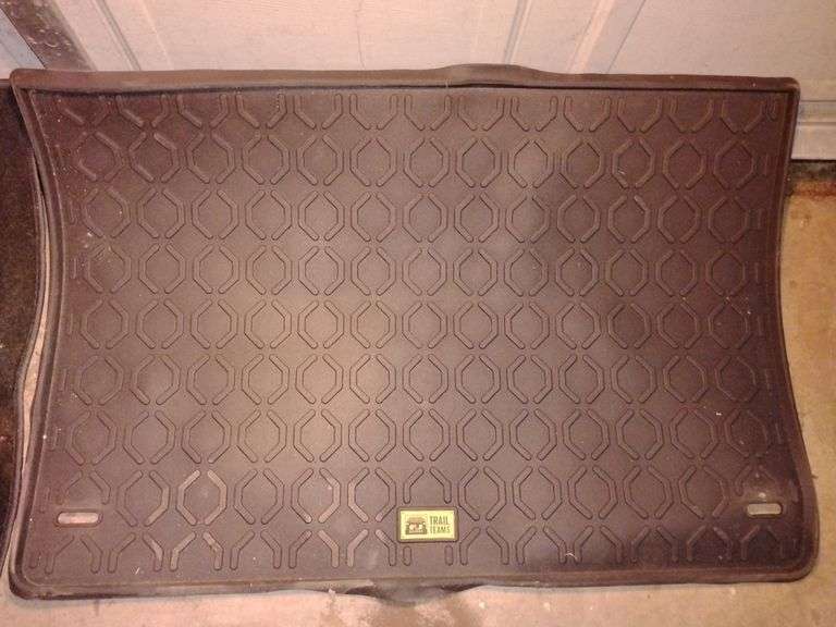 Toyota FJ floor and back mats, there is one carpet back compartment mat and one rubber. image