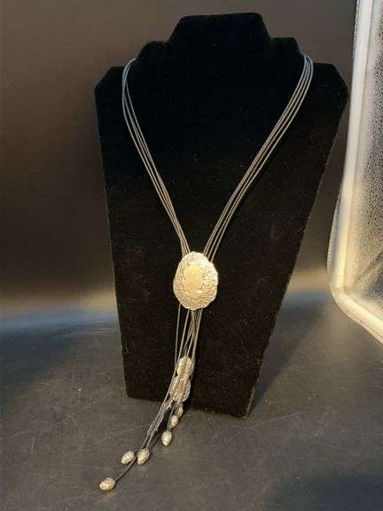 Statement lariat western style necklace from  Chico’s image