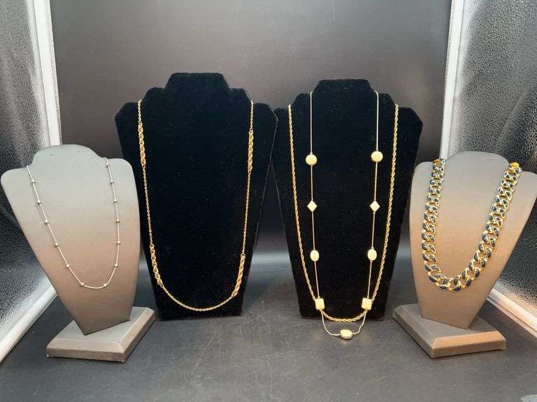 Nice grouping of gold tone necklaces image