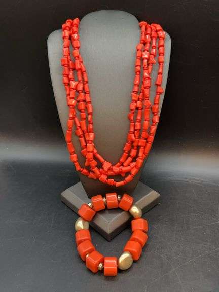 Matching coral colored beaded multi-strand necklace and bracelet image