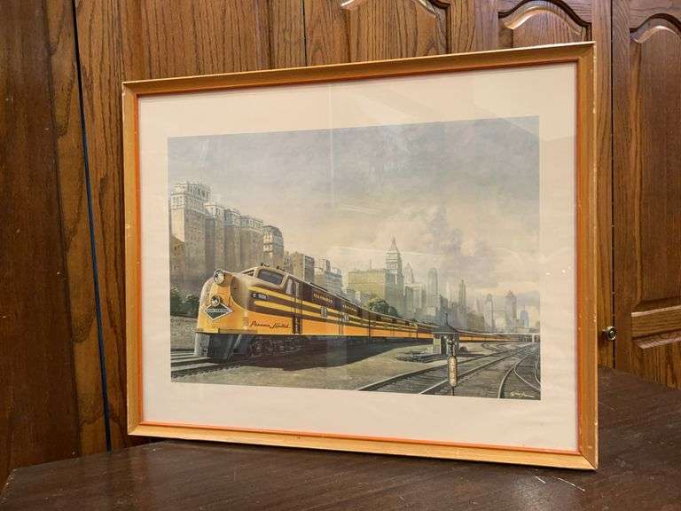 Framed/signed print depicting the Illinois Central Railroad's "Panama Limited" passenger train…..26-1/4 x 21…..frame has blemishes image