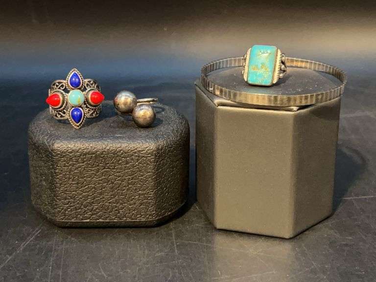(2) sterling rings, (1) turquoise ring (not marked) and (1) sterling bracelet…..rings are sizes 8, 7 and 5…..19 total grams image