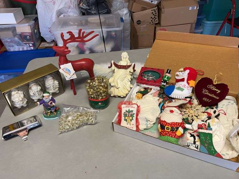 Great grouping of Christmas decor….3 porcelain Santa’s, really nice beaded garland, resin Santa in purple, Pottery Barn stocking holder, vintage handcrafted ornaments image