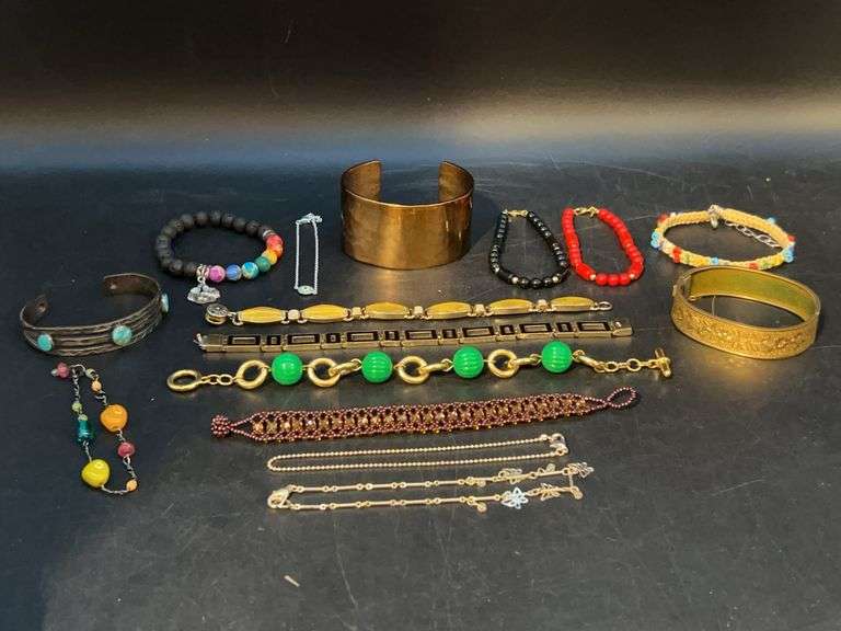 Great selection of various styles of bracelets by Chico’s, Monet and others image