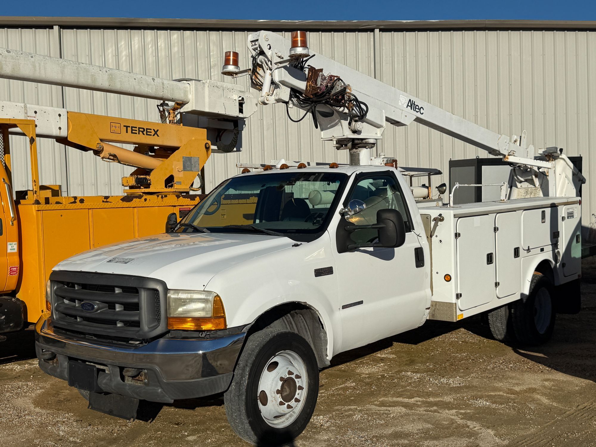 More To Come! Year-End Vehicle Sale: Cars, Vans, Trucks, and Bucket Trucks! featured photo 8