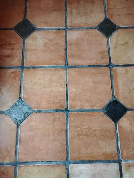 Terra Cotta Tile Flooring, floor pieces 15 1/4" x 15 1/2" x 3/4" Thick, staircase pieces 11 3/4" x 10 1/4" x 10 1/2" deep x 3/4" thick. 22 staircase pieces, 60 floor pieces. Photos showing laid floor are for example only. BUYER IS RESPONSIBLE FOR REMOVAL. image