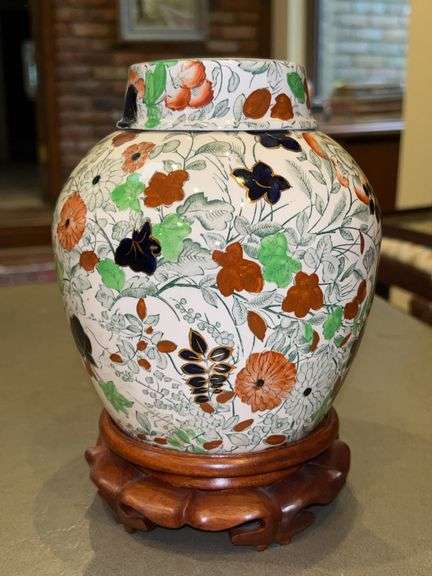 Brilliantly colored Royal Cauldon lidded ginger jar on wood base…..7” tall without base image