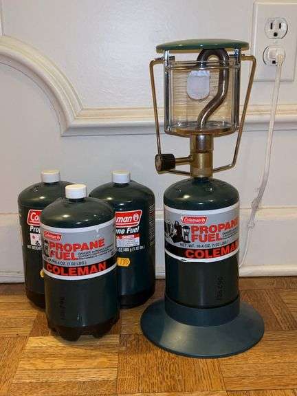 Coleman Propane Lantern with (3) additional bottles….amount in each is unknown image