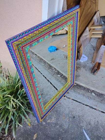 Handcrafted in Mexico, wooden accent mirror 27" x 38", painted with vibrant color designs. New image