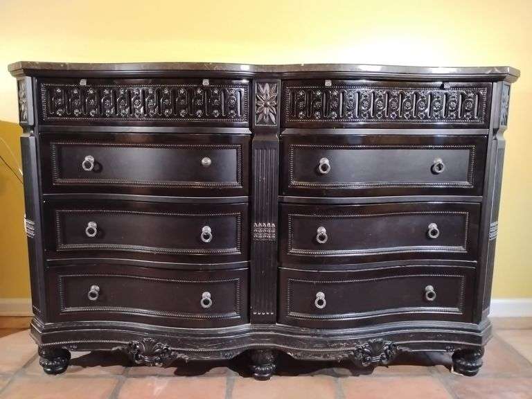 ***Missing drawer pull is found and fixed, photo to be updated shortly***Ashley Britannia Rose 8 drawer dresser Black Rose Finish with marble top. 44 1/4" T x 69 1/2" L x 20" D. Good condition. Heavy.  Located on 2nd floor. This piece is really heavy and large and will have to be maneuvered around the staircase. BUYER IS RESPONSIBLE FOR REMOVAL. image