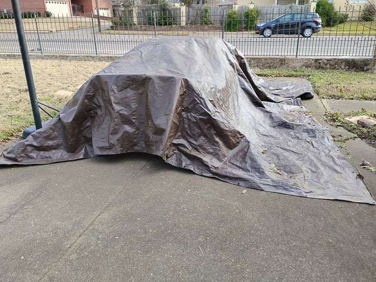 Tarp Heavy Duty, near new, brown/silver sides, approx. 19' x 15', has one hole about 1". image