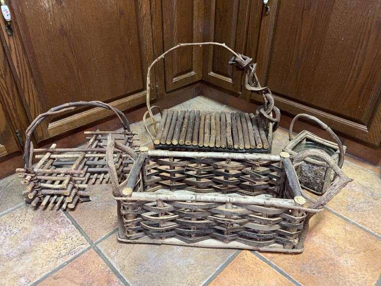 Grouping of rustic looking baskets in various styles and sizes image