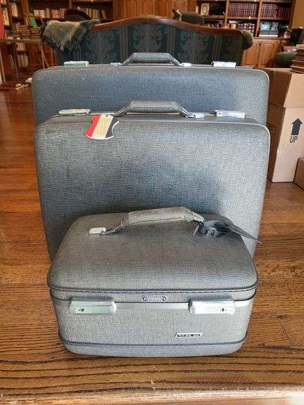 3-piece hard shell American Tourister luggage set…..large, medium and train-case….small stain on lining of middle size and insert tray in train-case is broken on one corner image