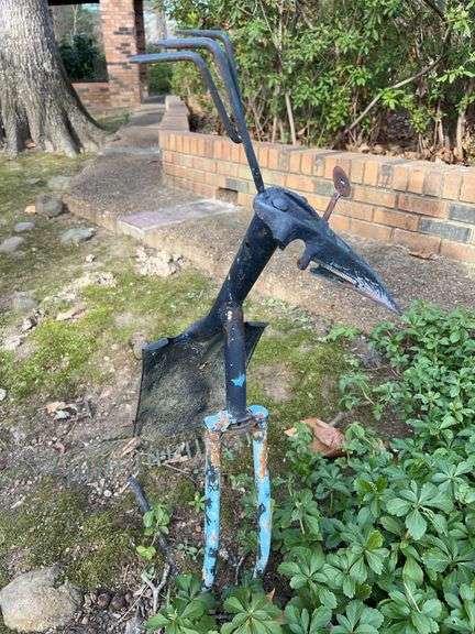 Handcrafted bird constructed from scrap yard tools image