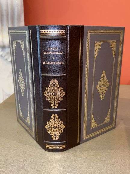 “David Copperfield” by Charles Dickens…..leather/cloth bound, gold stamped, gold gilt edges and smyth binding image