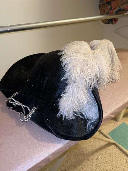 Vintage black velvet tricorne or pirate hat with white ostrich feathers and a rhinestone accent…..feathers are shedding from age image