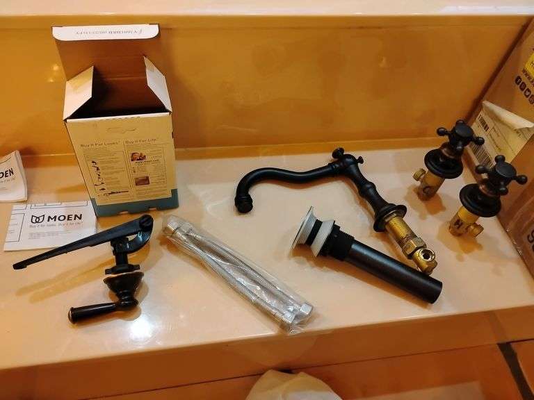 Bathroom Basin Sink Faucet, widespread, oil rubbed bronze and toilet tank lever. New in box. image