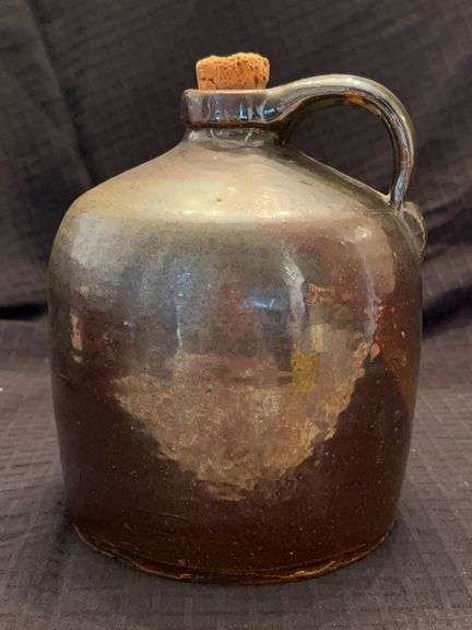 Vintage brown glazed stoneware jug with cork stopper…..8” tall image