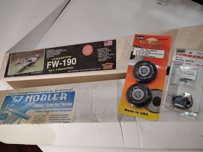 2 Model Planes, '57 Nobler "Green Box" seems complete, FW-190 may not be complete, 1 pack low bounce treaded wheels and CS-11 Micro Servo image