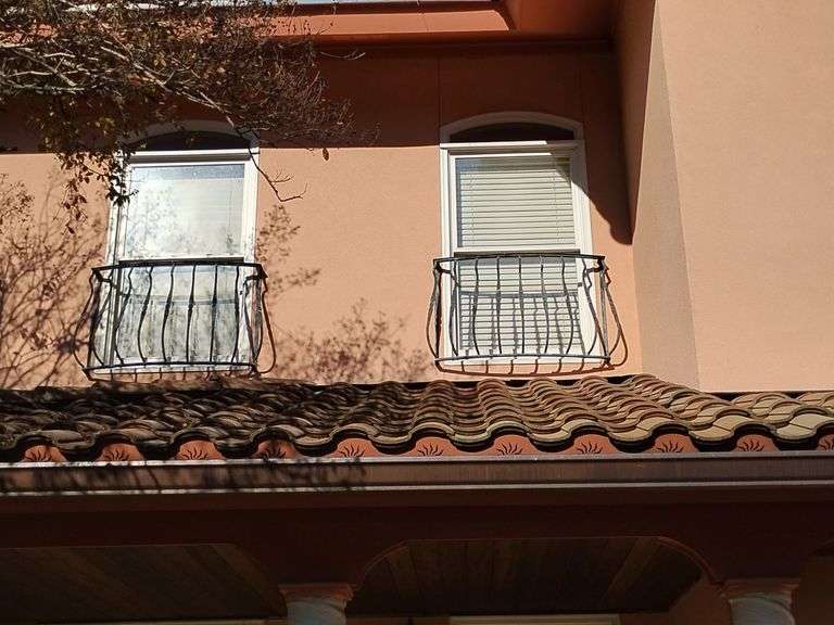 1 Decorative Exterior Window Grill, aged green finish, the mounting sides are 42 1/2" inside width, 44 1/2" outside width, 28 3/4" T, where it curves is 11 3/4" at deepest. Photo shown on house is an example only. image
