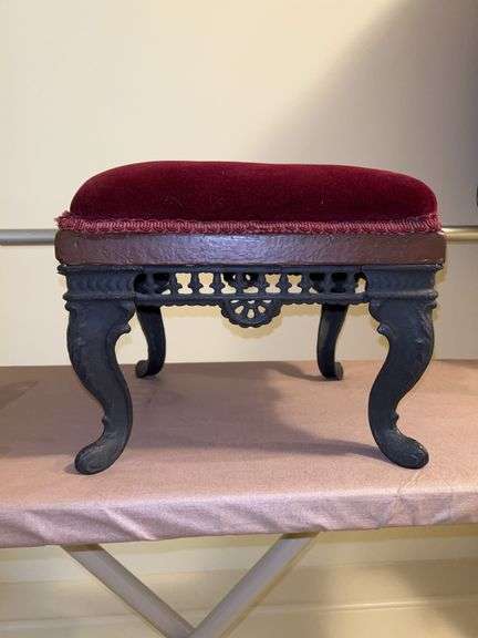 Vintage decorative wrought iron base stool with maroon velvet seat…..11-3/4 x 11-1/2 x 10” tall….there is damage on one corner (see pics) image