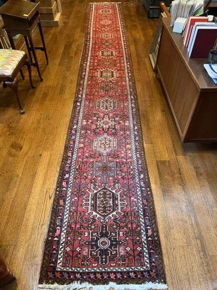 Nice runner in shades of red, coral, blue…..19’10” x 2’8”…..see image of tag for info….tag is faded and hard to read….does have a small area where sun has faded runner image