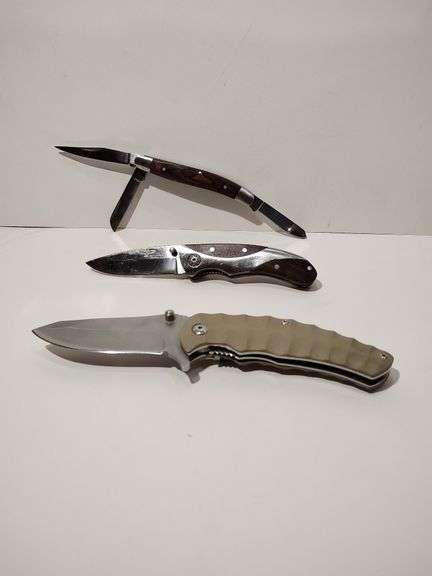 Assortment, Winchester 3 blade stockman wood handle, Appalachian Trail tactical liner lock, WalMart folding image